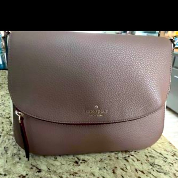 Kate Spade purse. Only used once. It is a beautiful bag. - Picture 1 of 4